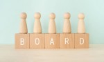BOARD; Wooden blocks with "BOARD" text of concept and human toys.